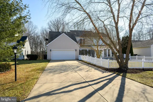 a view of a swimming pool with a yard