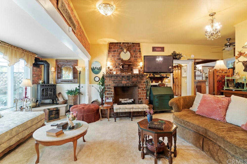 18777 Walnut Road Castro Valley, CA 94546 - Photo 20 of 68 a living room with furniture and a fireplace