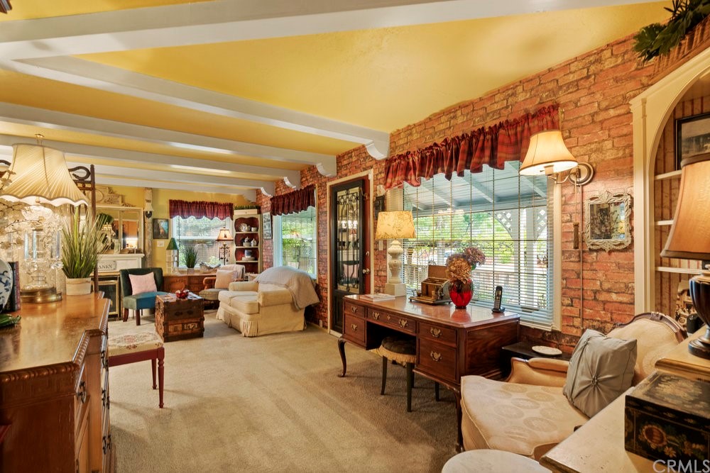 18777 Walnut Road Castro Valley, CA 94546 - Photo 37 of 68 a living room with furniture and a floor to ceiling window