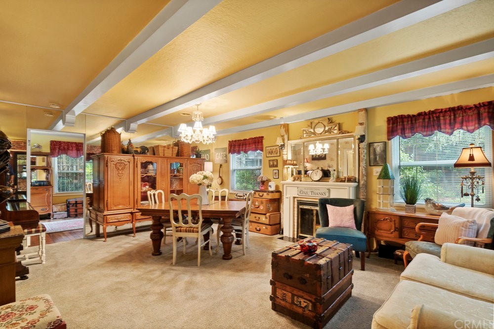 18777 Walnut Road Castro Valley, CA 94546 - Photo 39 of 68 a living room with furniture a fireplace and city view