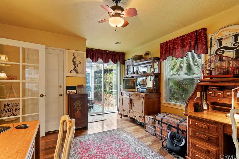 18777 Walnut Road Castro Valley, CA 94546 - Photo 46 of 68 a view of a workspace with furniture and a flat screen tv