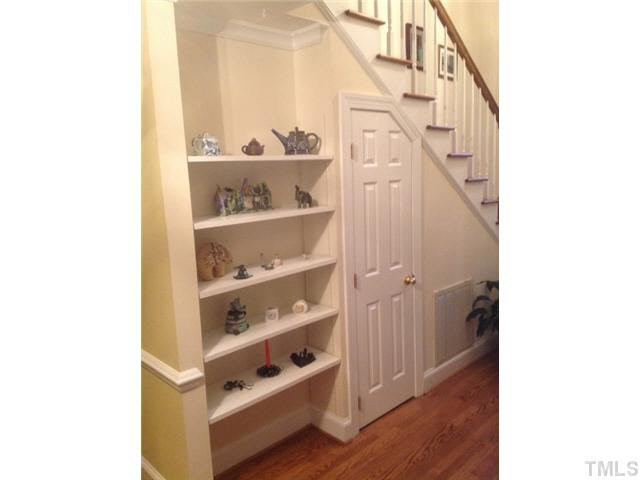 2105 Camrose Street Raleigh, NC 27608 - Photo 13 of 16 Built-in bookshelves in front hallway.