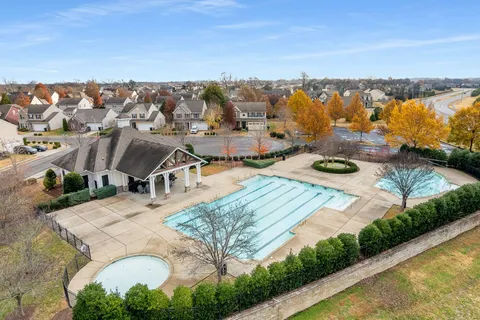 an aerial view of a house having yard