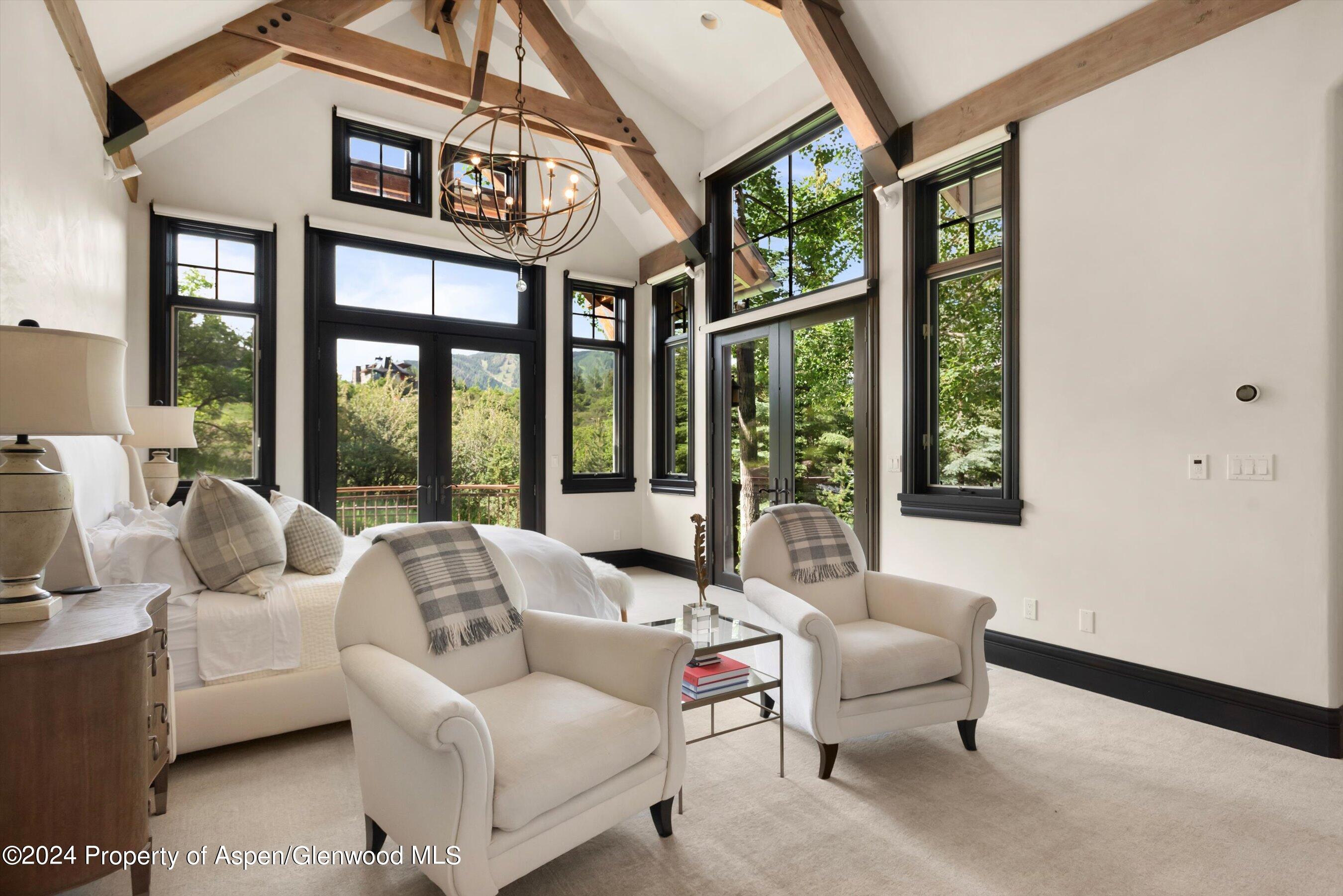 27 Nighthawk Drive Aspen, CO 81611 - Photo 18 of 61 a living room with furniture and a large window