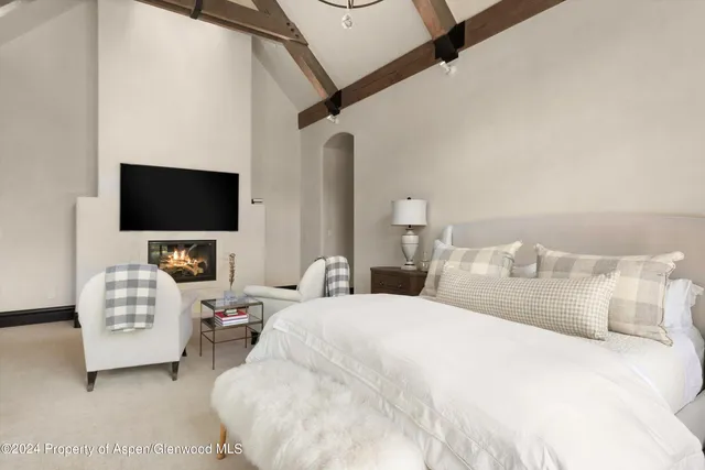 a bathroom with a bathtub and a sink