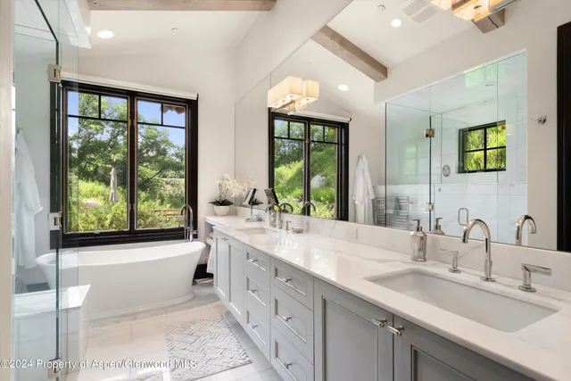 a workspace with furniture window and wooden floor
