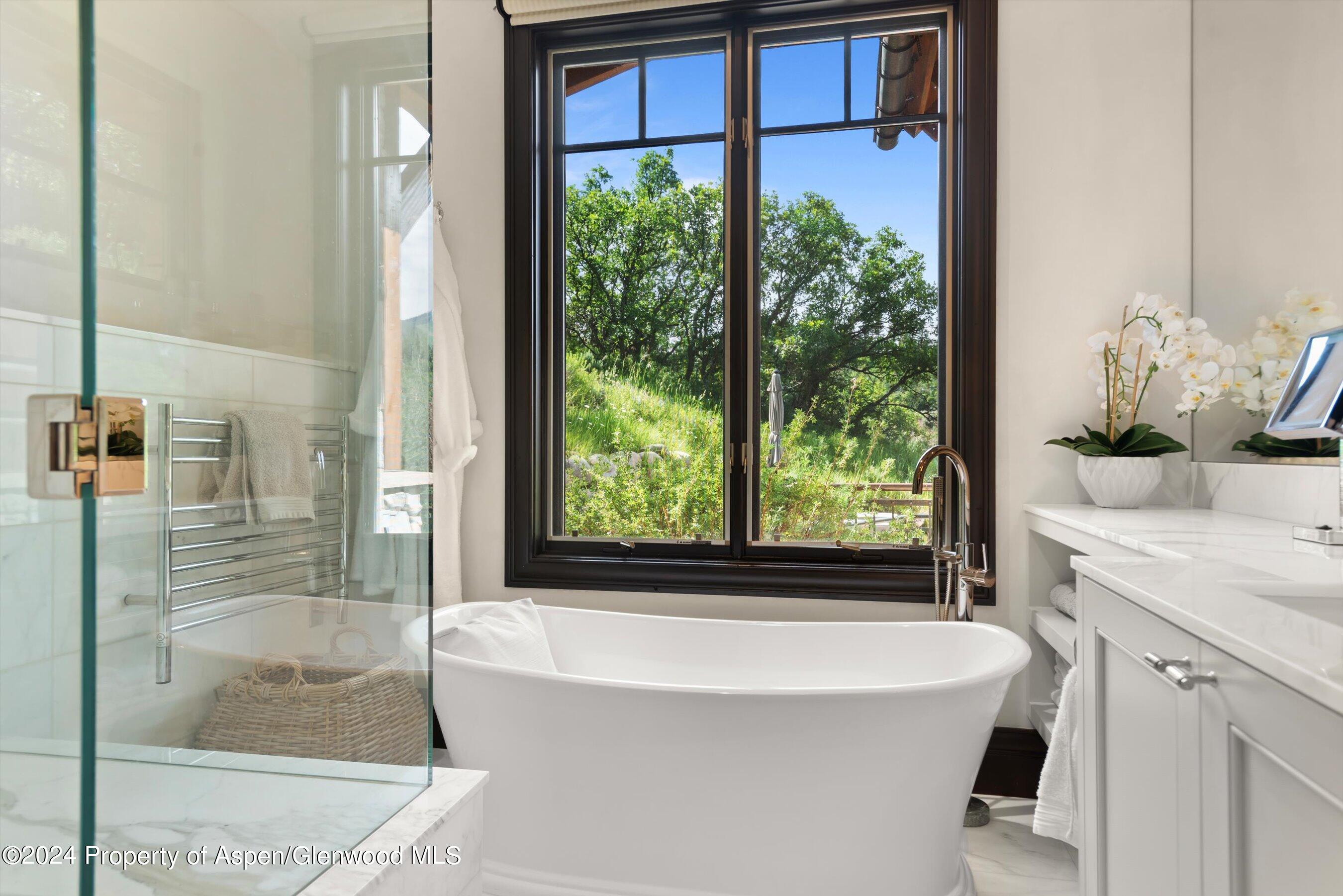 27 Nighthawk Drive Aspen, CO 81611 - Photo 23 of 61 a bathroom with a bathtub and a sink
