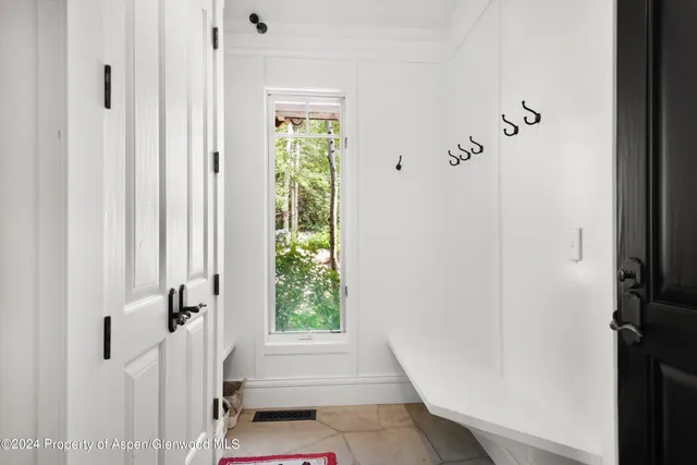 a bedroom with a bed and a fireplace