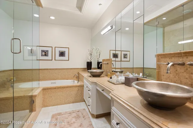 a bedroom with bed and a window