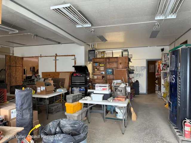 a view of a garage with storage
