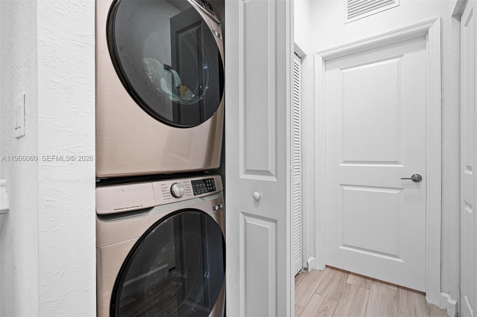 9941 Southwest 231st Lane, Unit 9941 Miami, FL 33190 - Photo 18 of 29 a utility room with dryer and washer