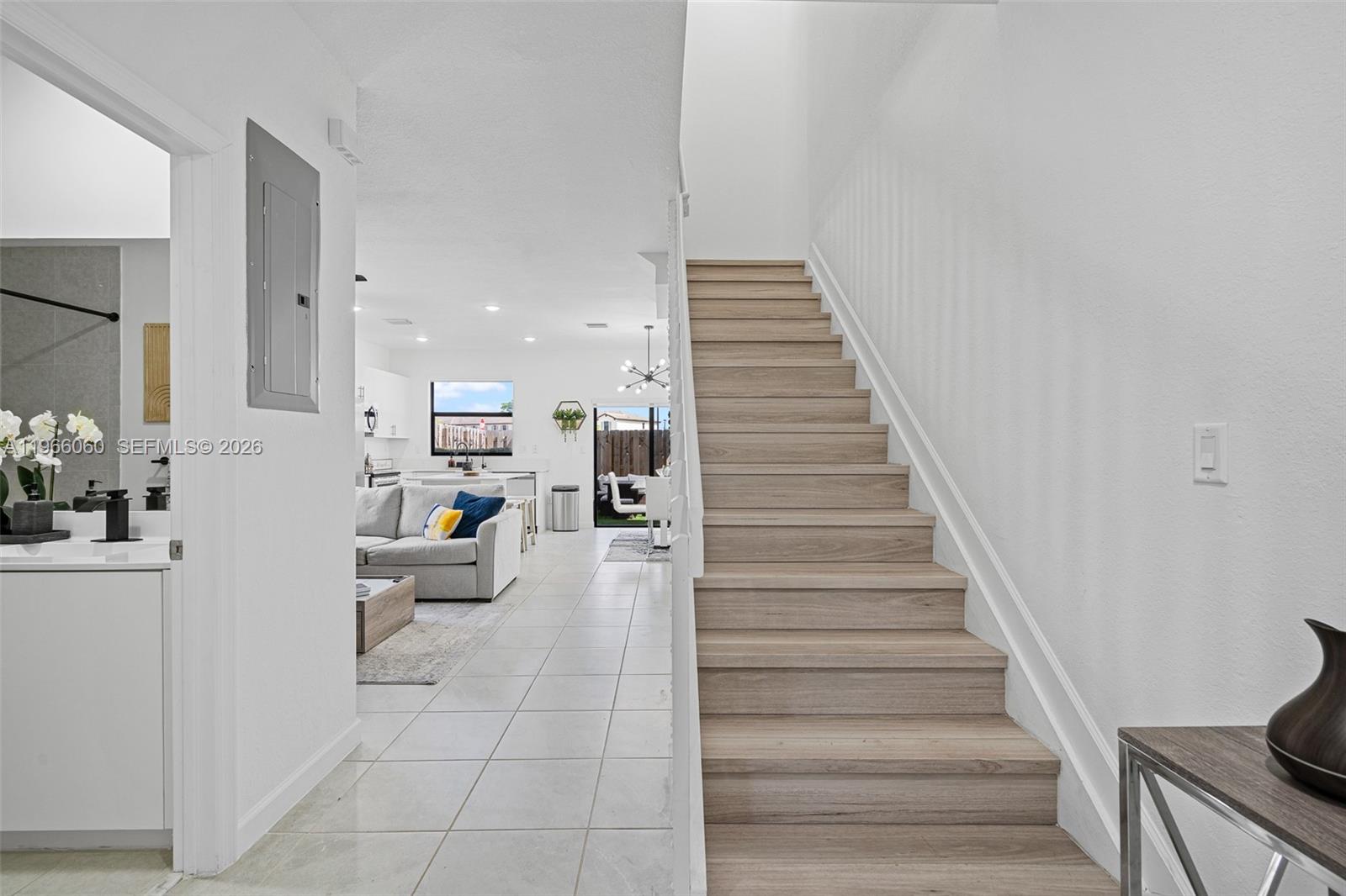 9941 Southwest 231st Lane, Unit 9941 Miami, FL 33190 - Photo 5 of 29 a view of entryway and hall