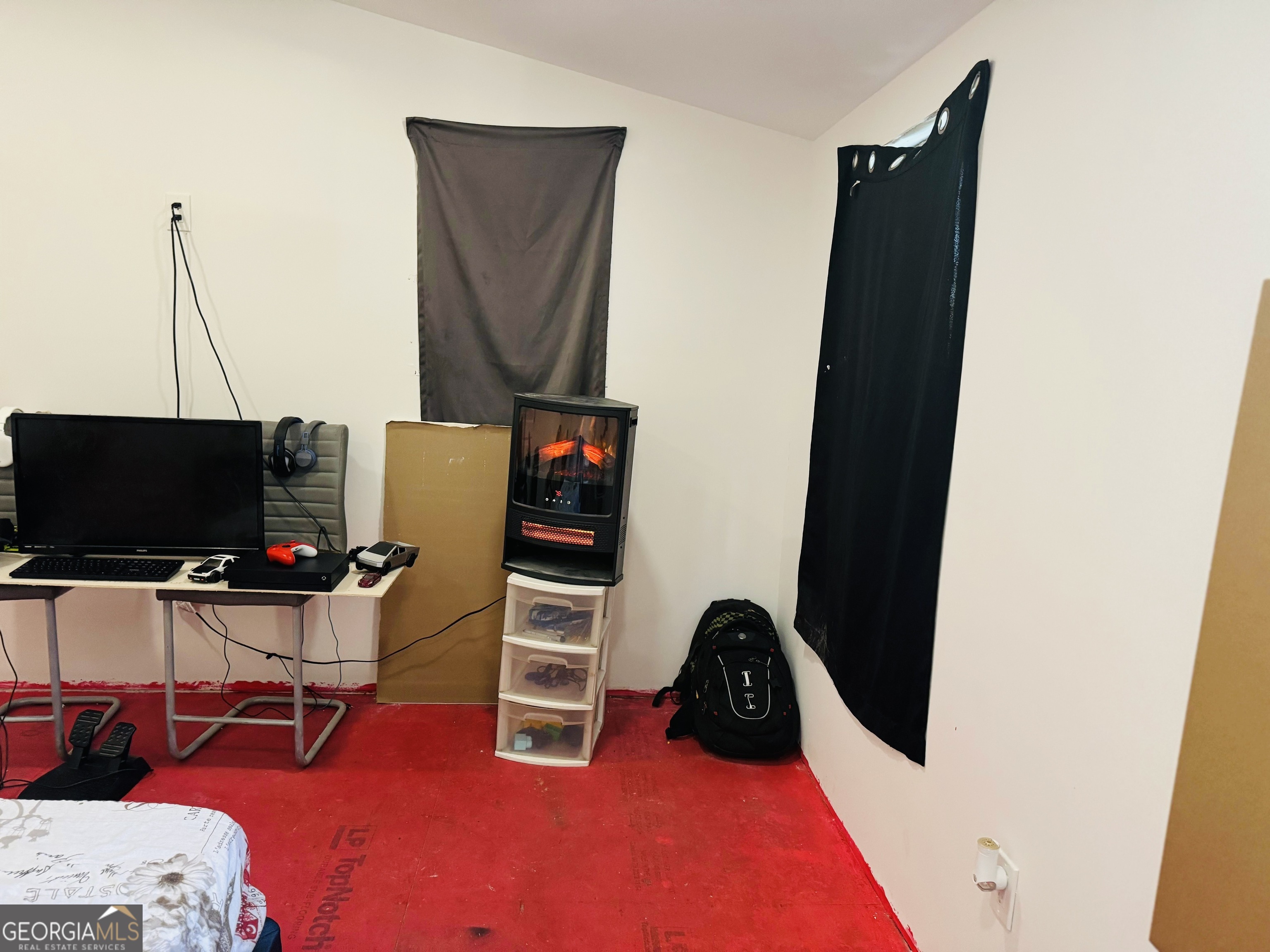 508 McKibben Road Buchanan, GA 30113 - Photo 15 of 20 a view of a workspace with furniture and screen