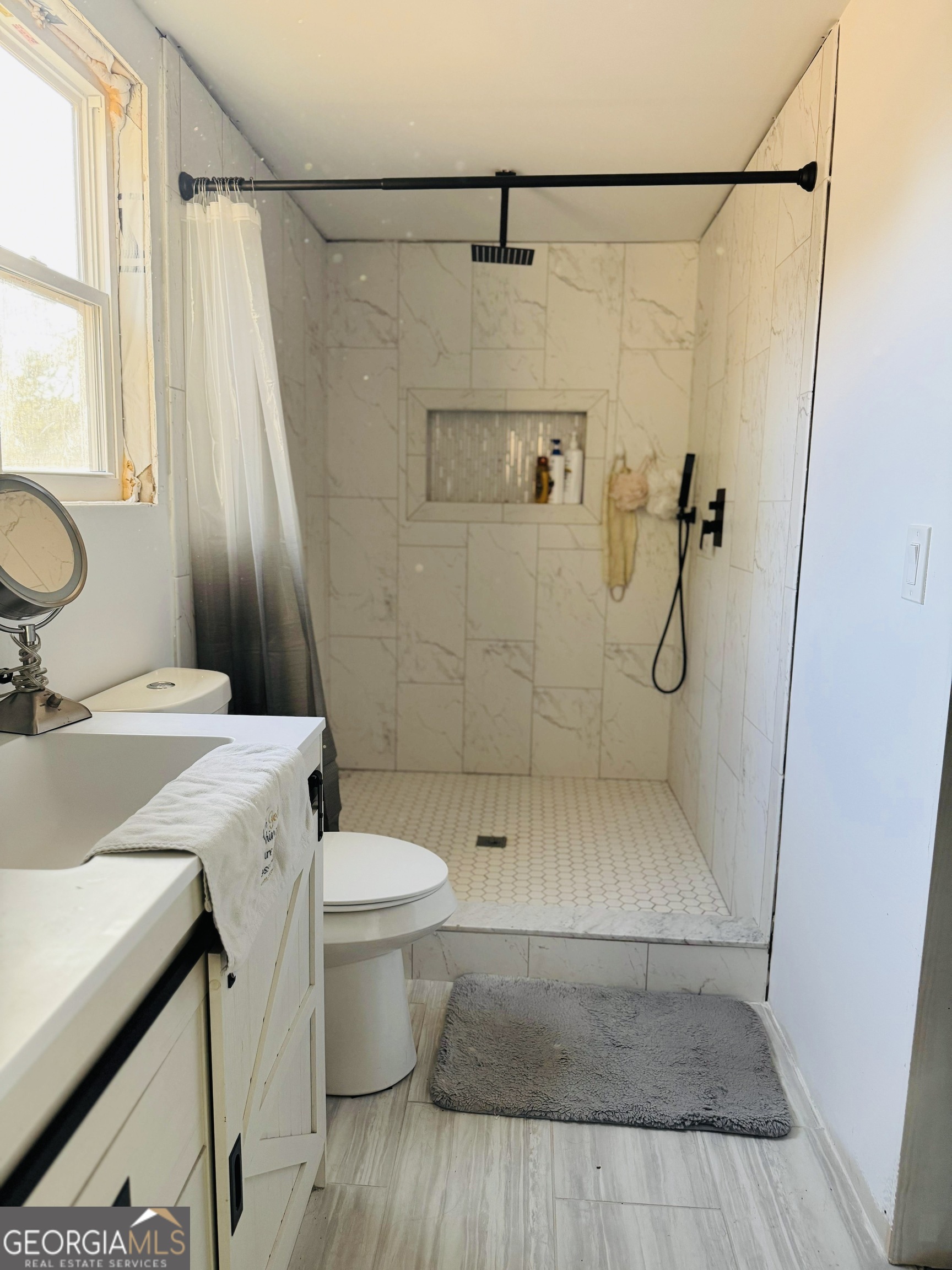 508 McKibben Road Buchanan, GA 30113 - Photo 20 of 20 a bathroom with a sink a toilet and shower