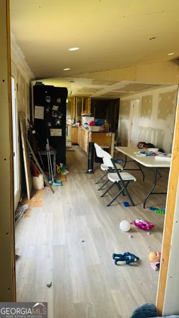 a room with furniture and gym equipment