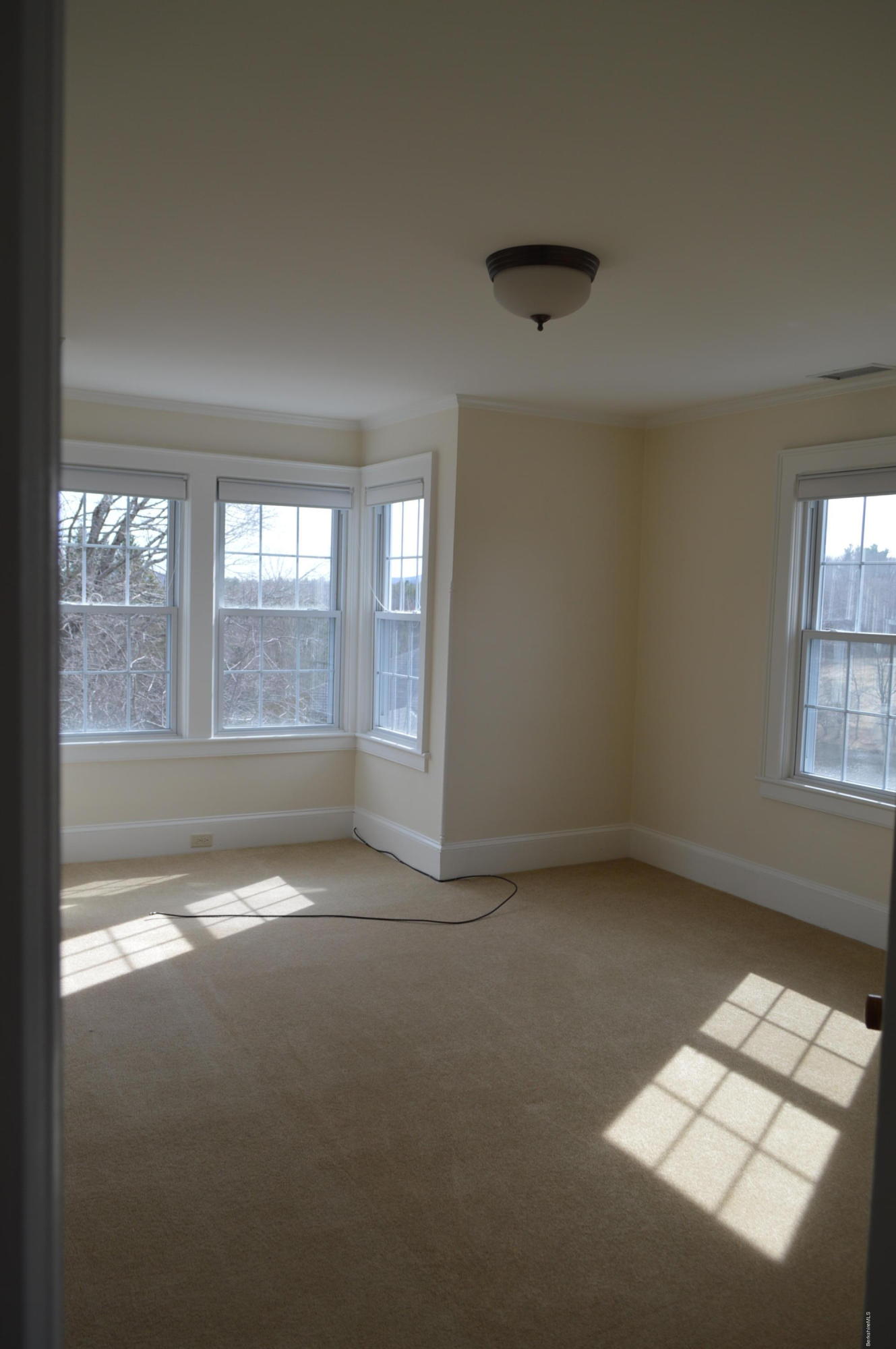 11 Rossiter Road Richmond, MA 01254 - Photo 18 of 40 an empty room with windows