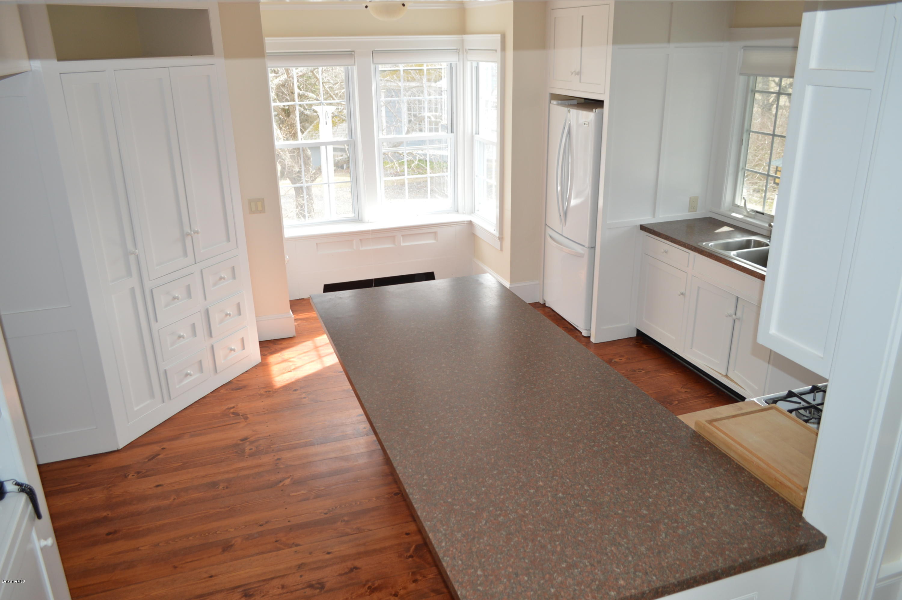11 Rossiter Road Richmond, MA 01254 - Photo 29 of 40 a view of a kitchen with wooden floor and a kitchen