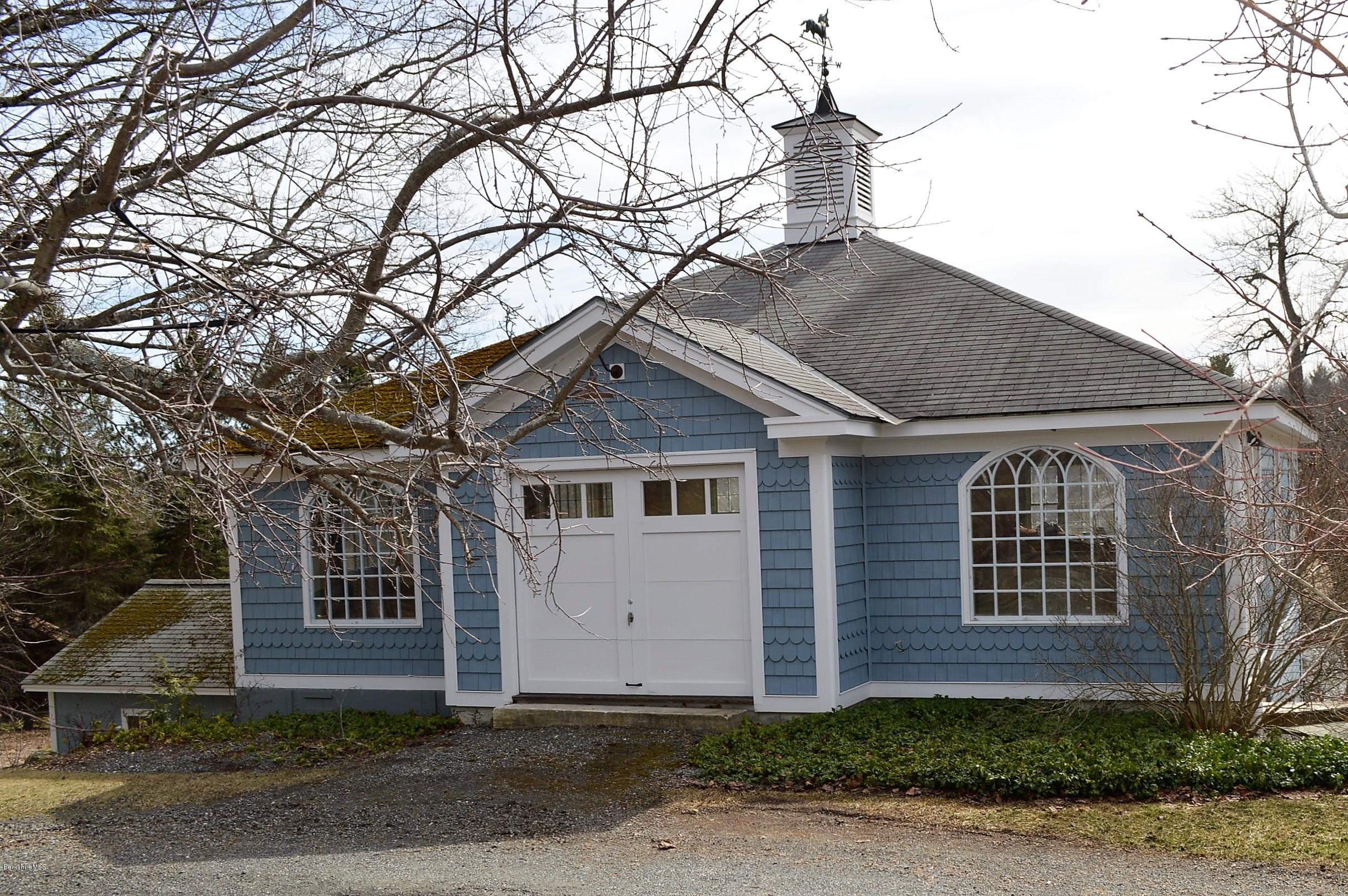 11 Rossiter Road Richmond, MA 01254 - Photo 4 of 40 a front view of a house with a yard and garage