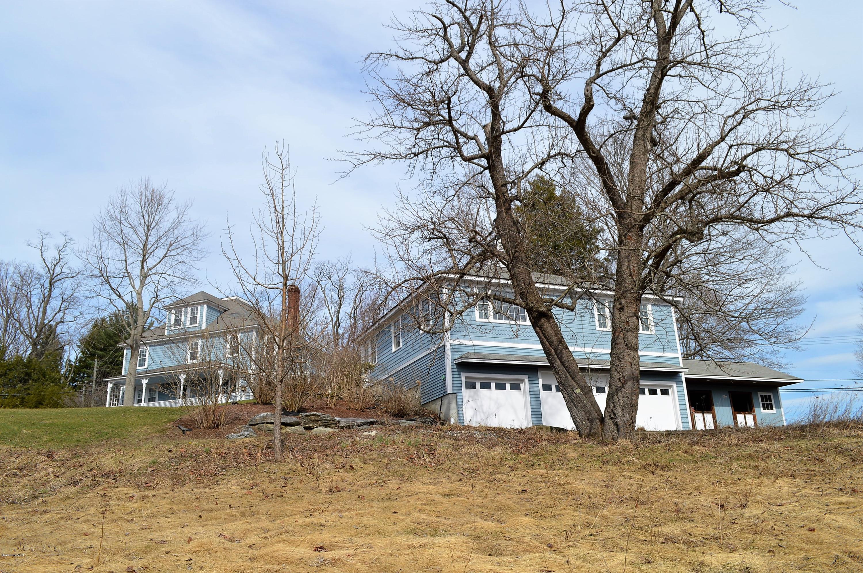11 Rossiter Road Richmond, MA 01254 - Photo 36 of 40 a front view of a house with a yard
