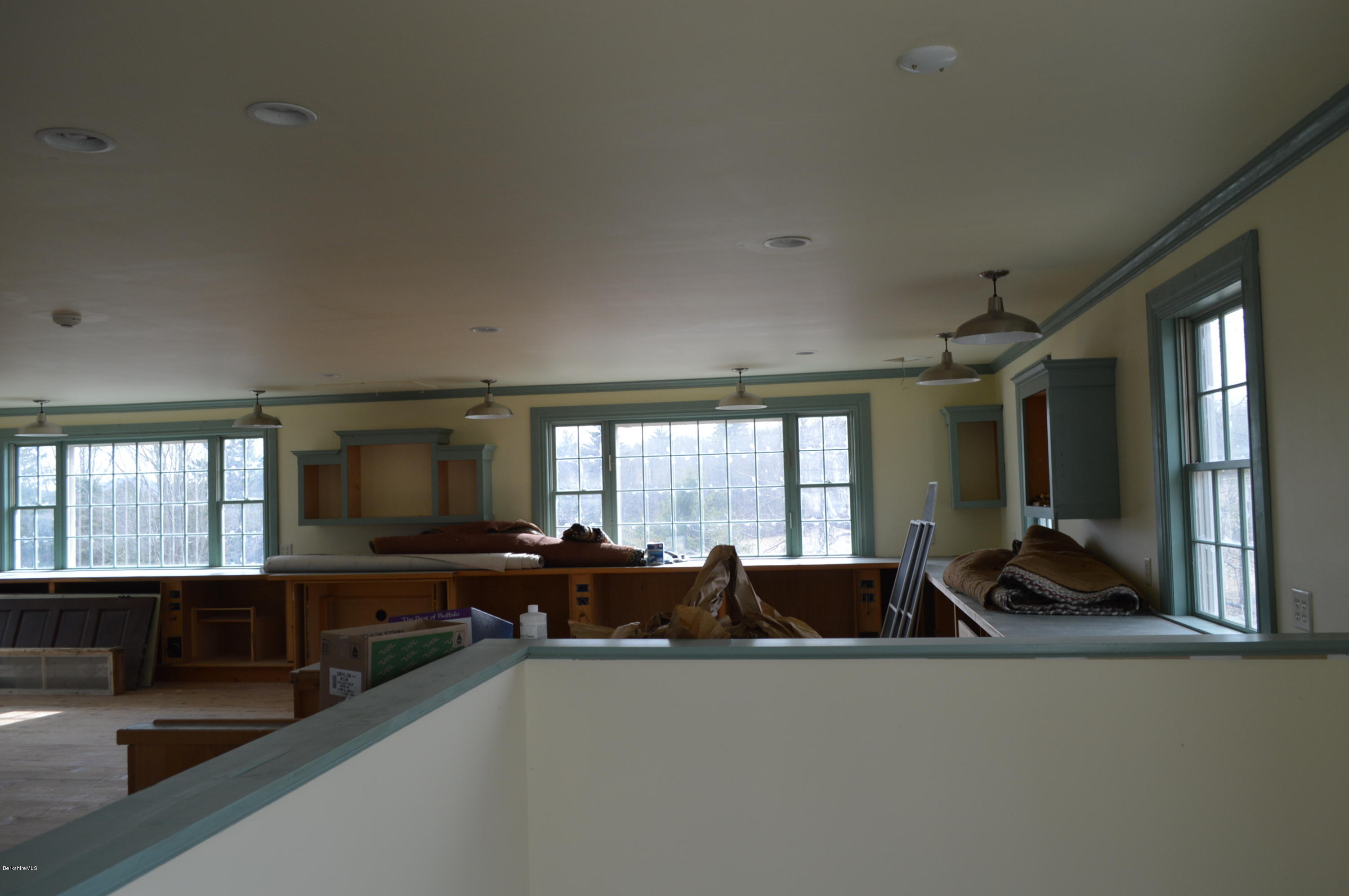 11 Rossiter Road Richmond, MA 01254 - Photo 39 of 40 a view of a livingroom with furniture a ceiling fan and windows
