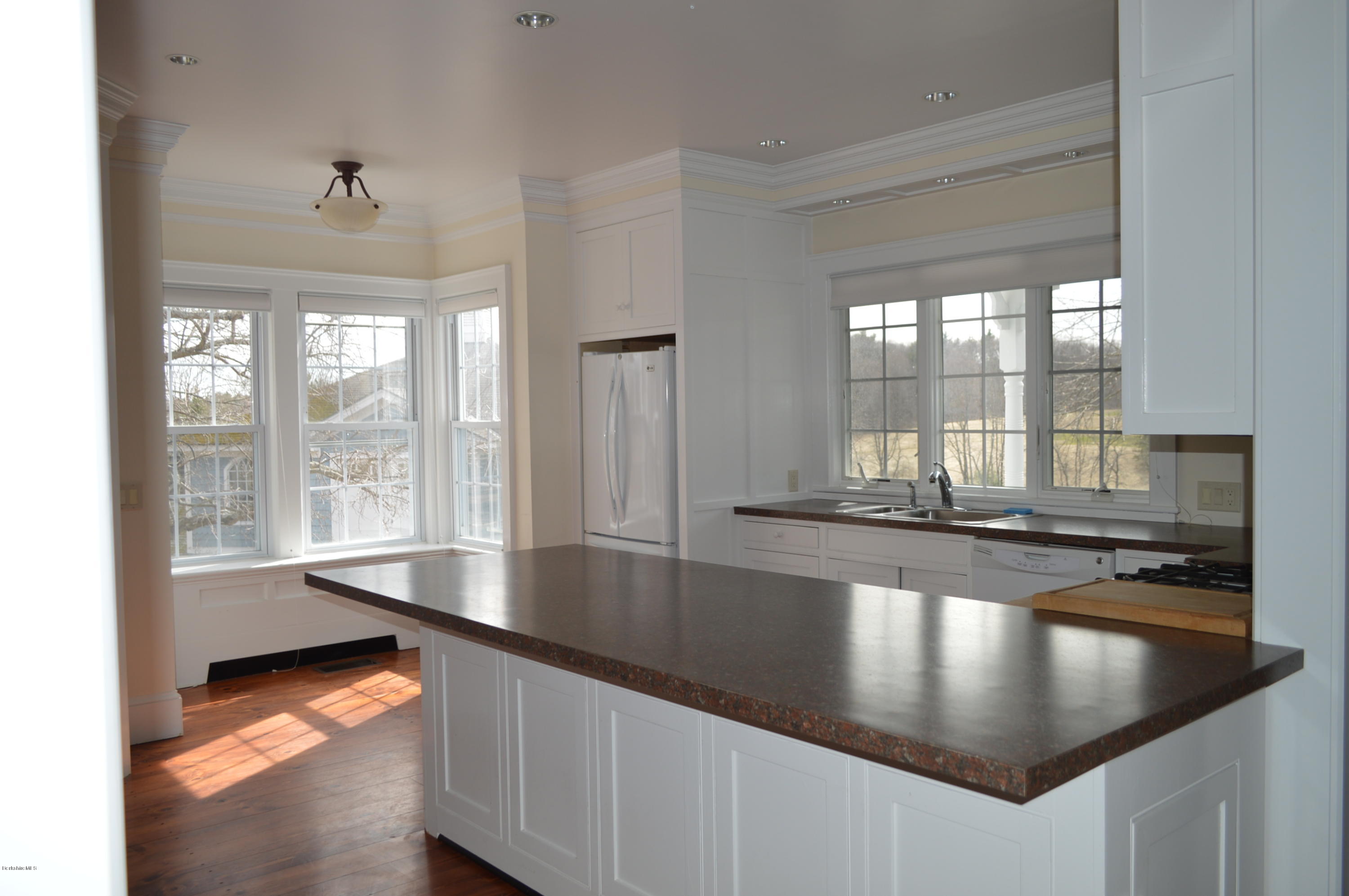 11 Rossiter Road Richmond, MA 01254 - Photo 7 of 40 a kitchen with stainless steel appliances granite countertop a sink stove and cabinets