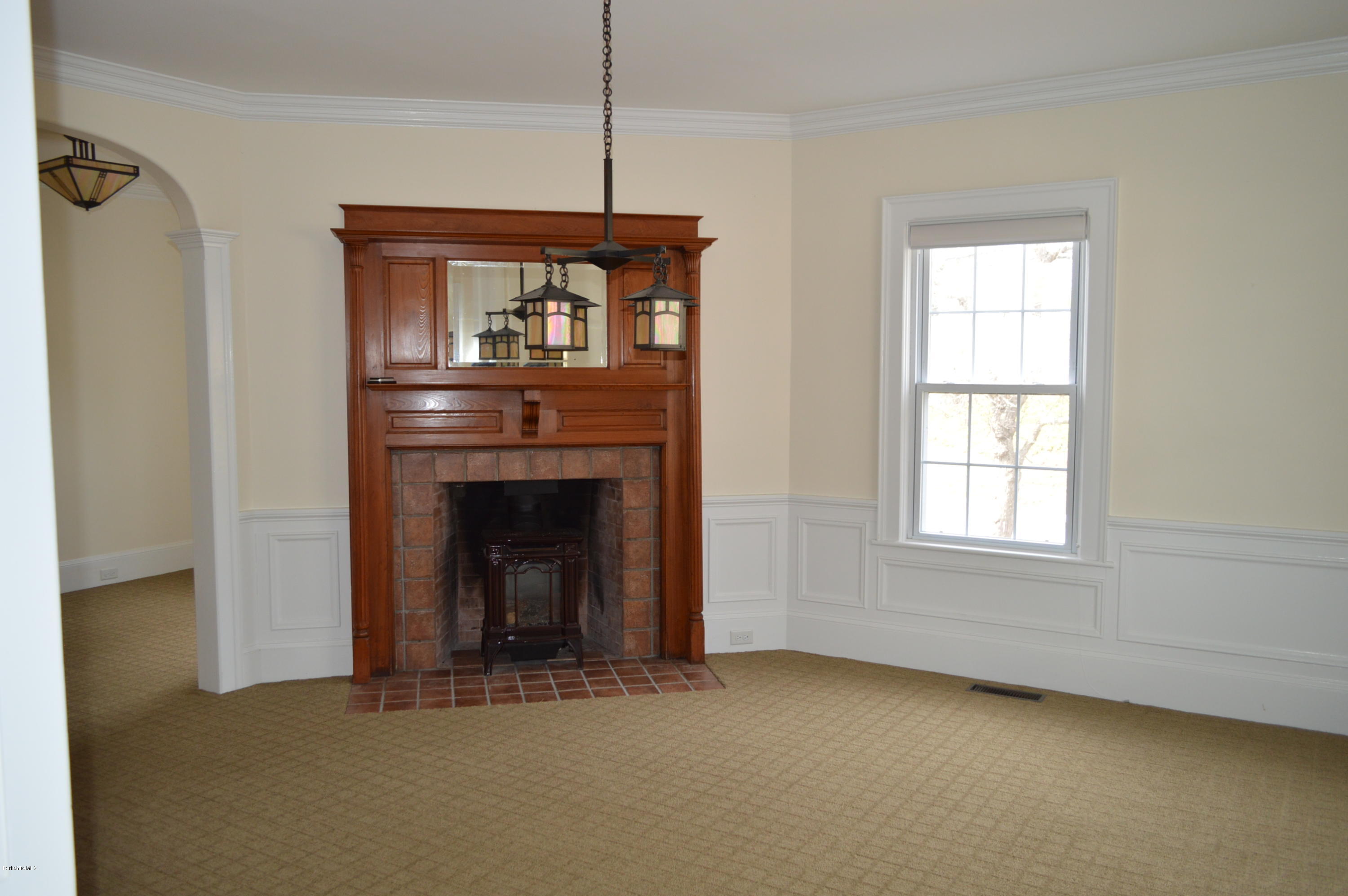 11 Rossiter Road Richmond, MA 01254 - Photo 8 of 40 a view of an empty room with window and fire place