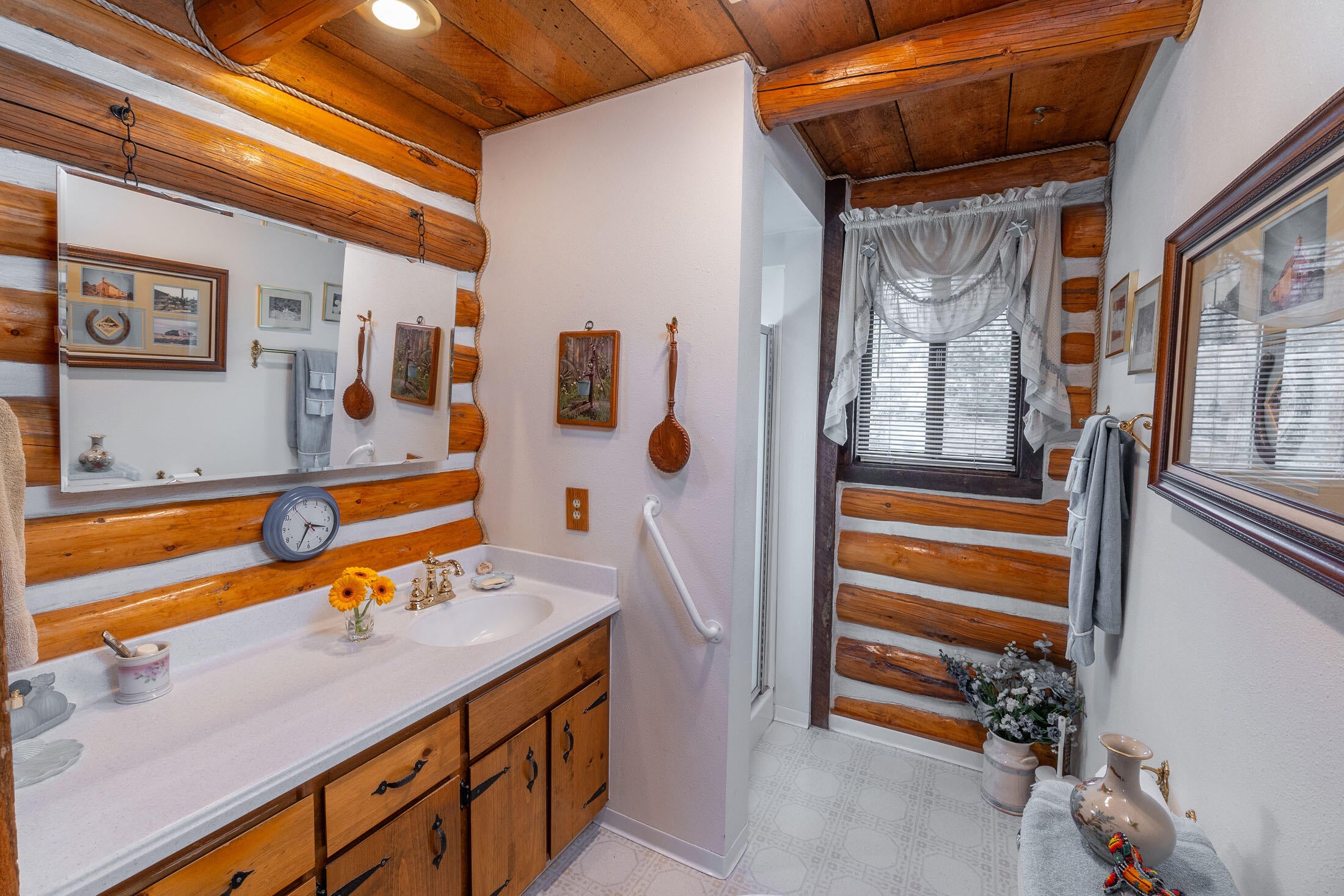 60384 Arnold Market Road Bend, OR 97702 - Photo 26 of 93 Main bath with window and shower. Not shown is the storage closet.
