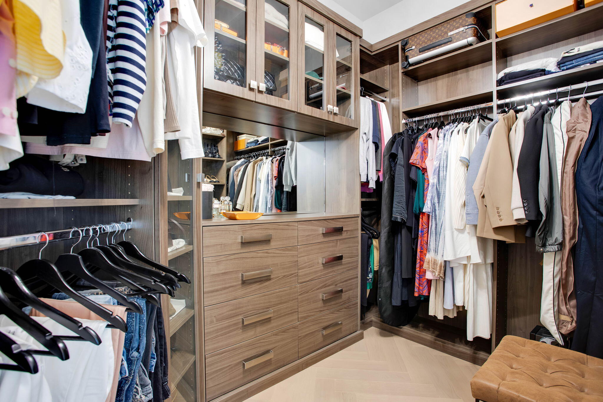 6903 Northwest 28th Avenue Boca Raton, FL 33496 - Photo 28 of 55 a view of walk in closet with clothes and shoes