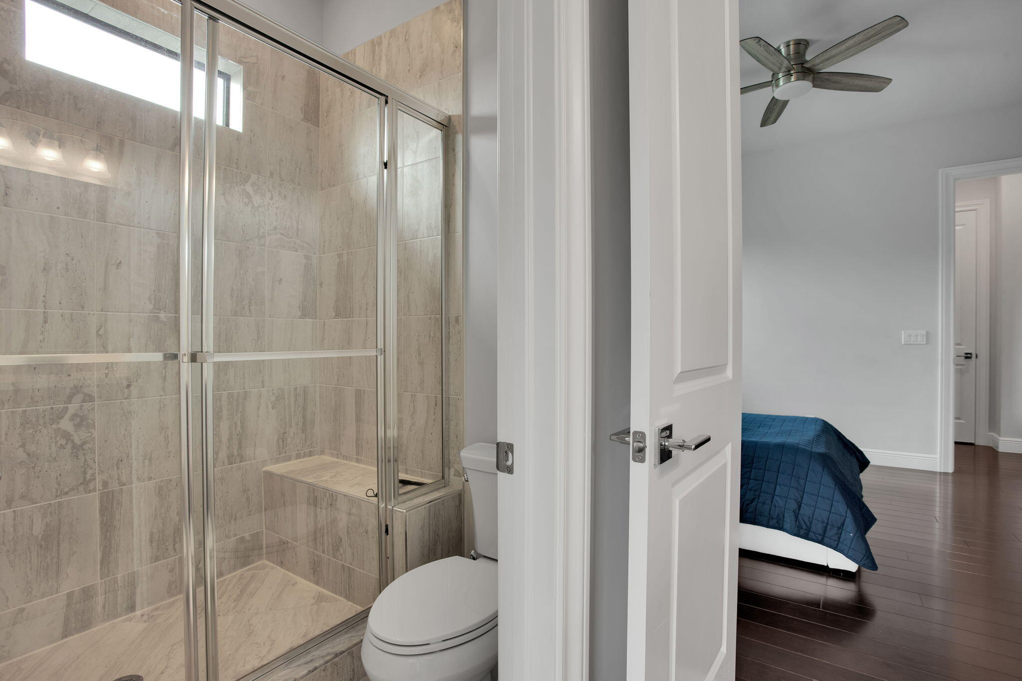 6903 Northwest 28th Avenue Boca Raton, FL 33496 - Photo 42 of 55 a bathroom with a shower a toilet and a sink