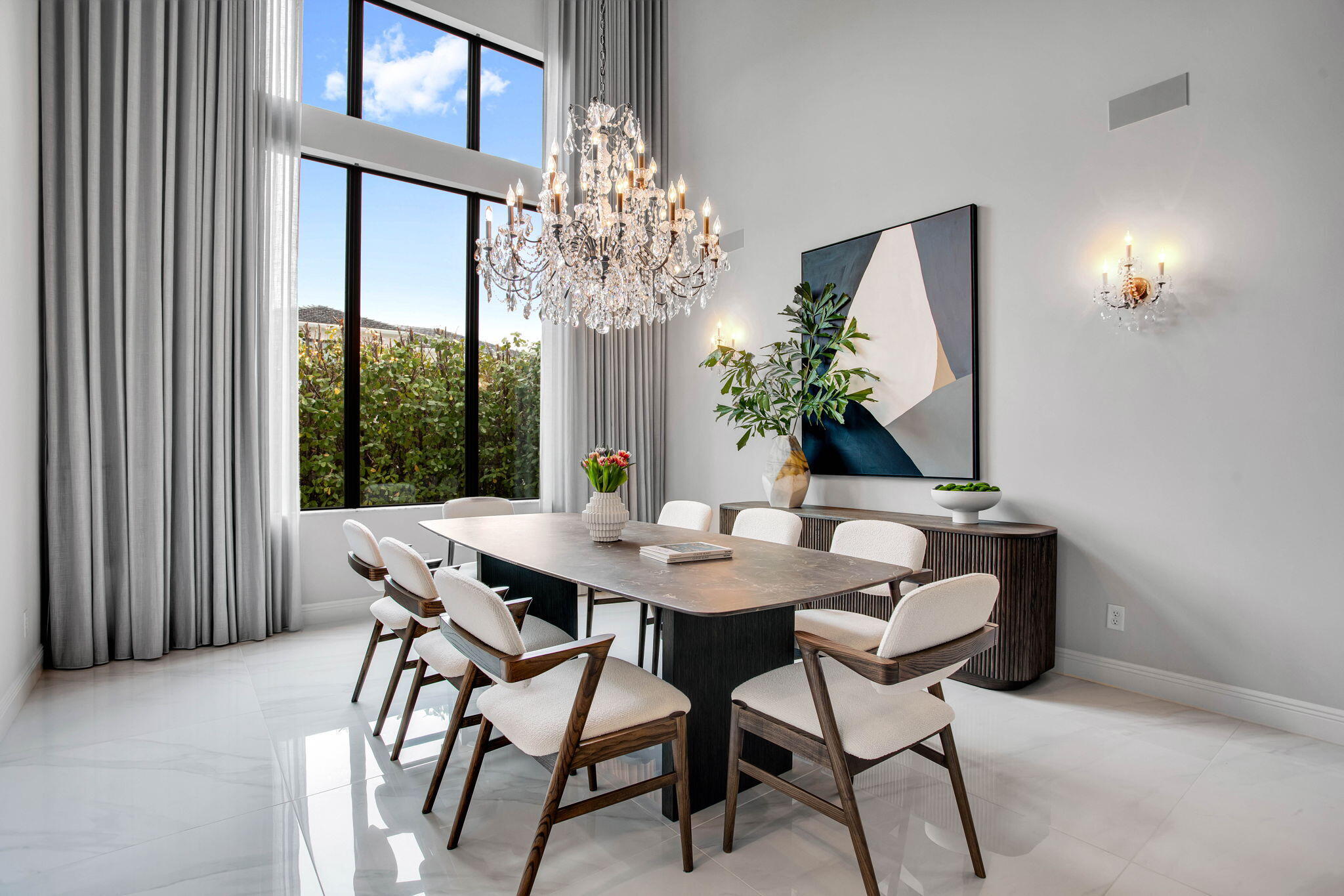 6903 Northwest 28th Avenue Boca Raton, FL 33496 - Photo 6 of 55 a view of a dining room with furniture and chandelier