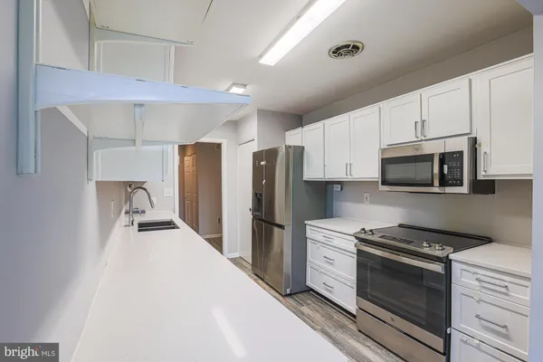$269,000 | 6350 Red Cedar Place, Unit 204, Baltimore, MD 21209