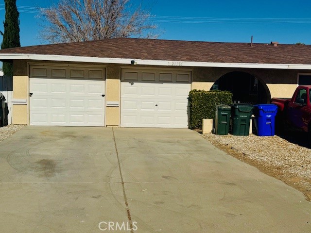 21186 Sitting Bull Road, Unit 2 Apple Valley, CA 92308 - Photo 2 of 13 Car garage