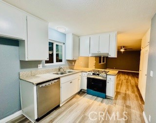 21186 Sitting Bull Road, Unit 2 Apple Valley, CA 92308 - Photo 5 of 13 Kitchen inside view