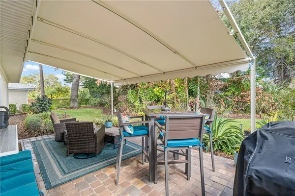 a patio view with a seating space