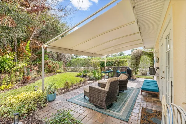a view of a couches in backyard of the house