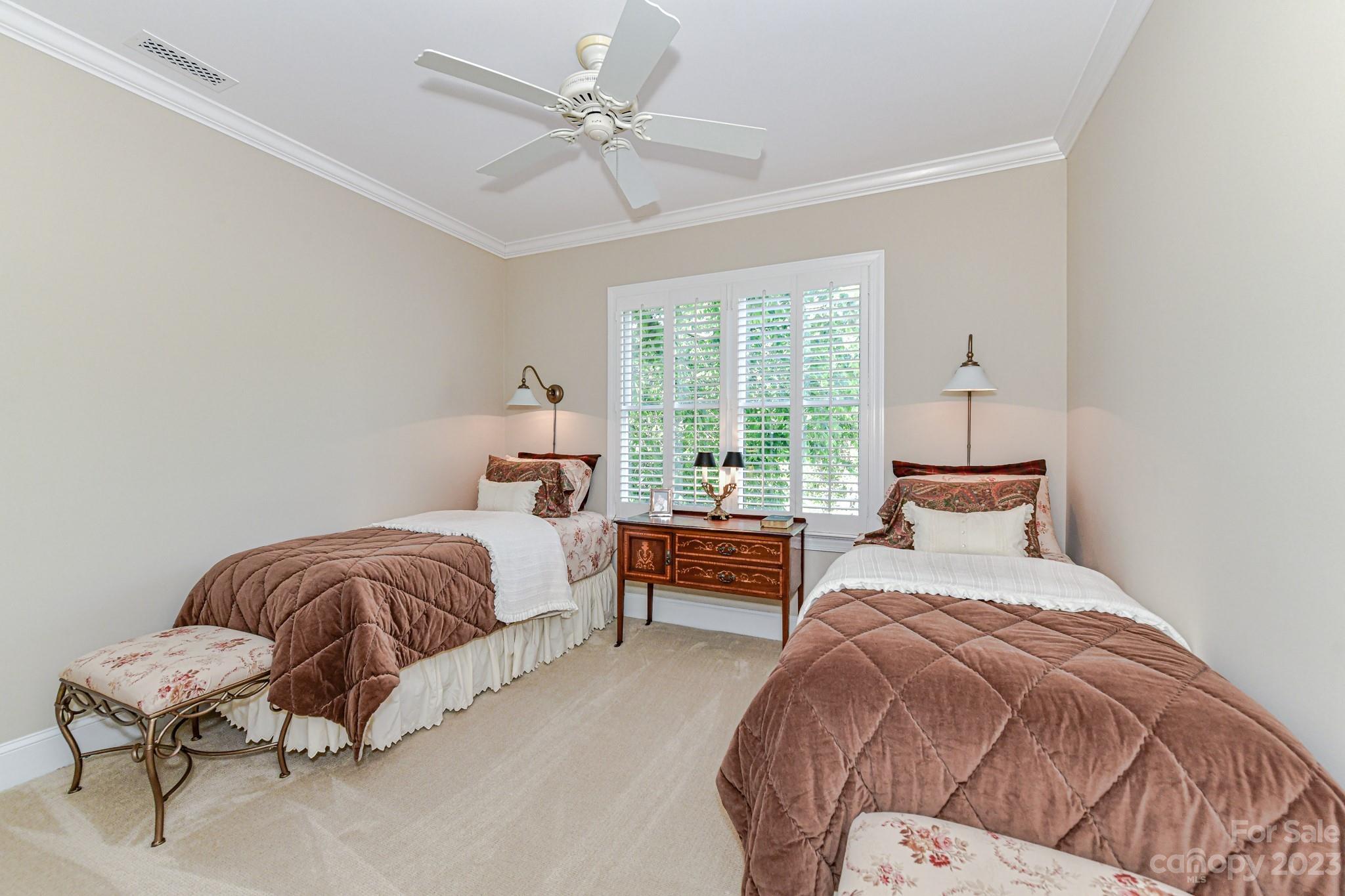 130 Morrison Hill Road Davidson, NC 28036 - Photo 21 of 29 a bedroom with a bed and wooden floor