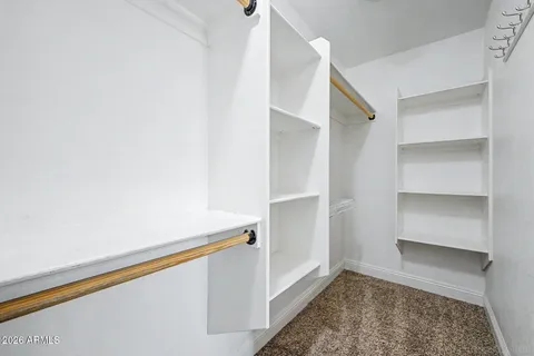 a view of an empty walk in closet