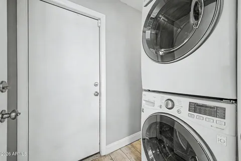 a view of livingroom with washer and dryer