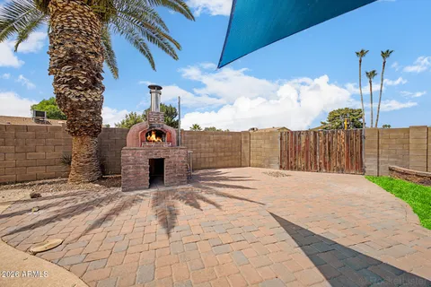 a view of a backyard of the house