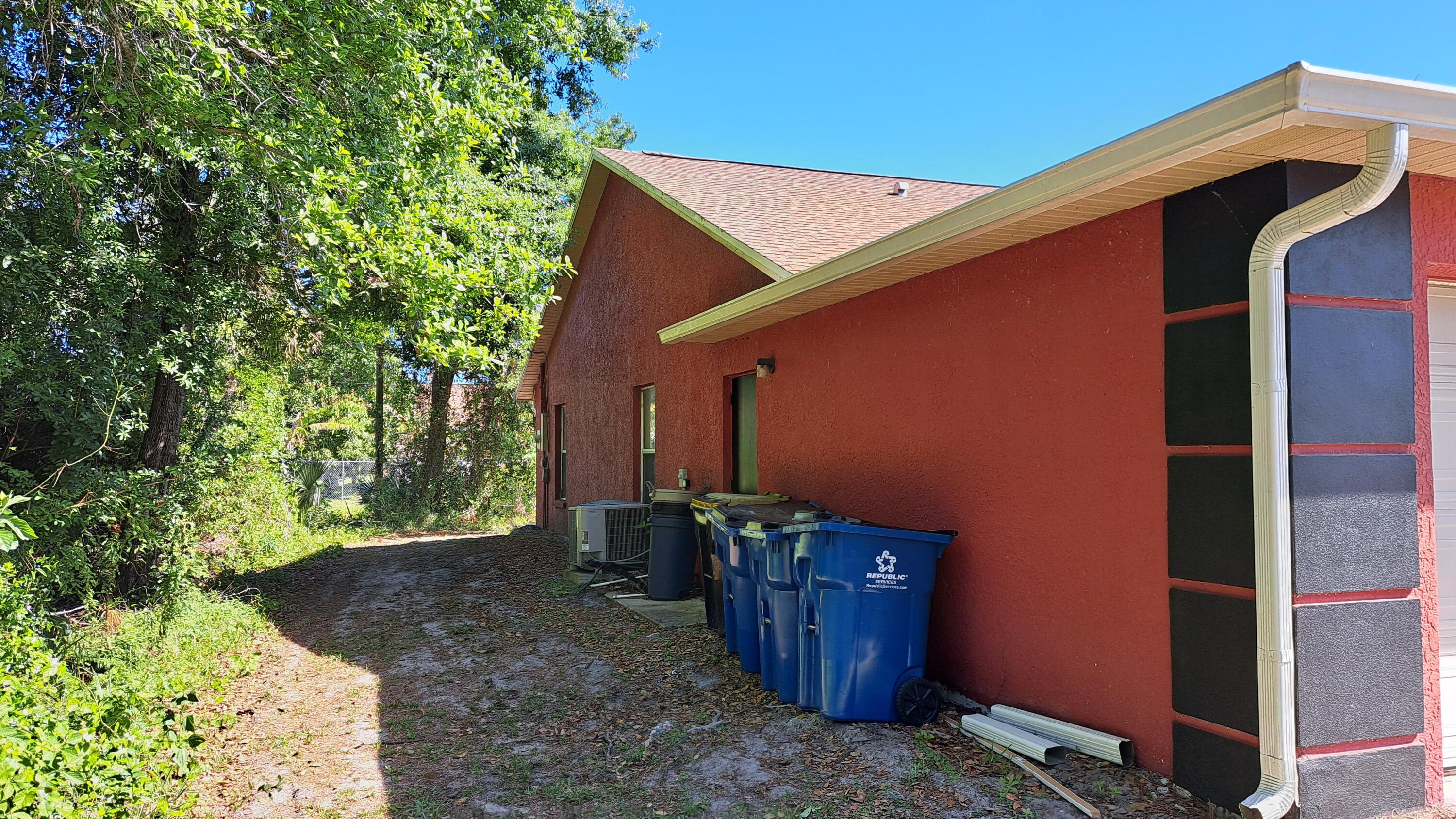 687 Raleigh Road Southeast Palm Bay, FL 32909 - Photo 2 of 26 Side View 1