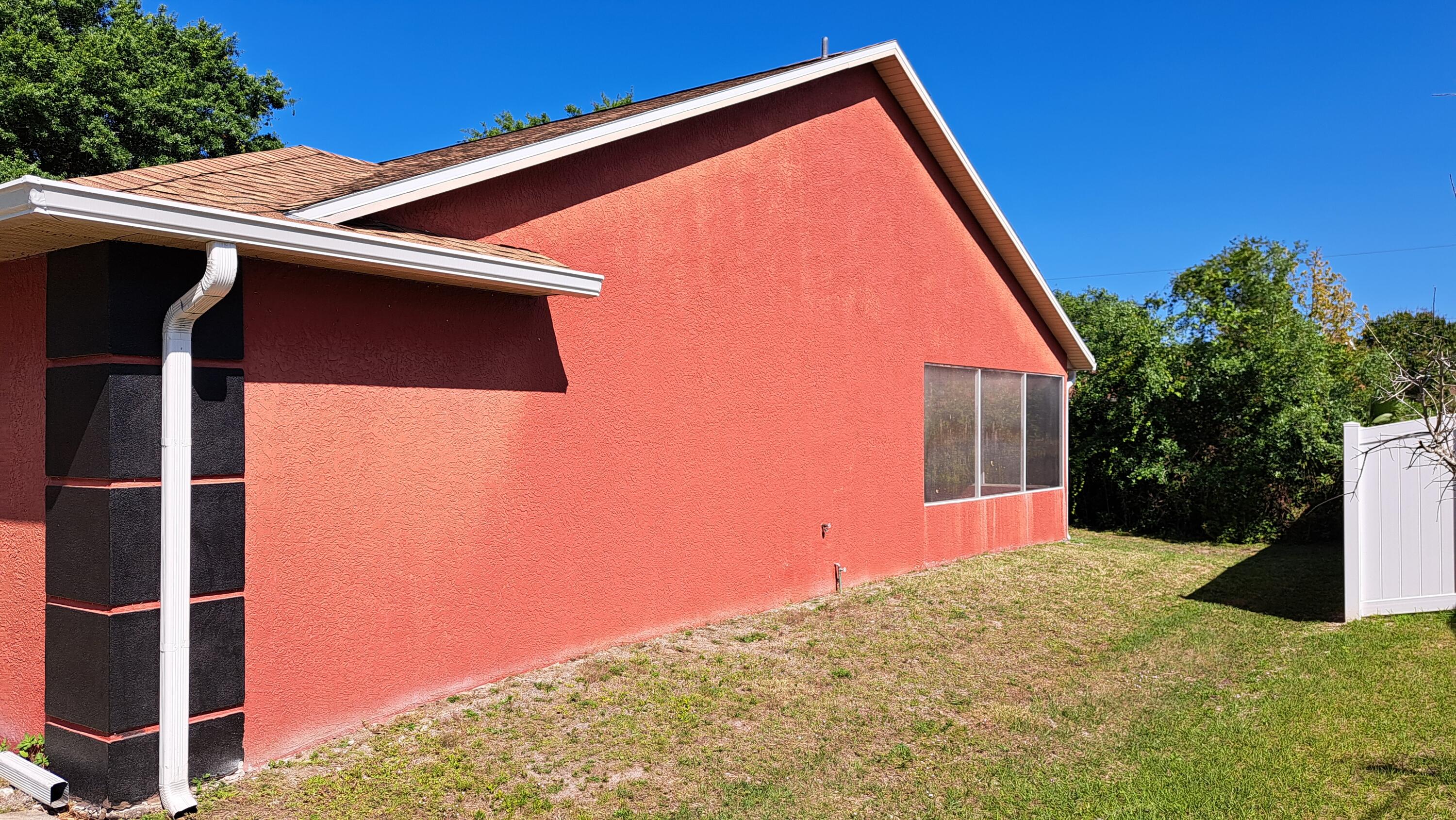 687 Raleigh Road Southeast Palm Bay, FL 32909 - Photo 3 of 26 Side View 2