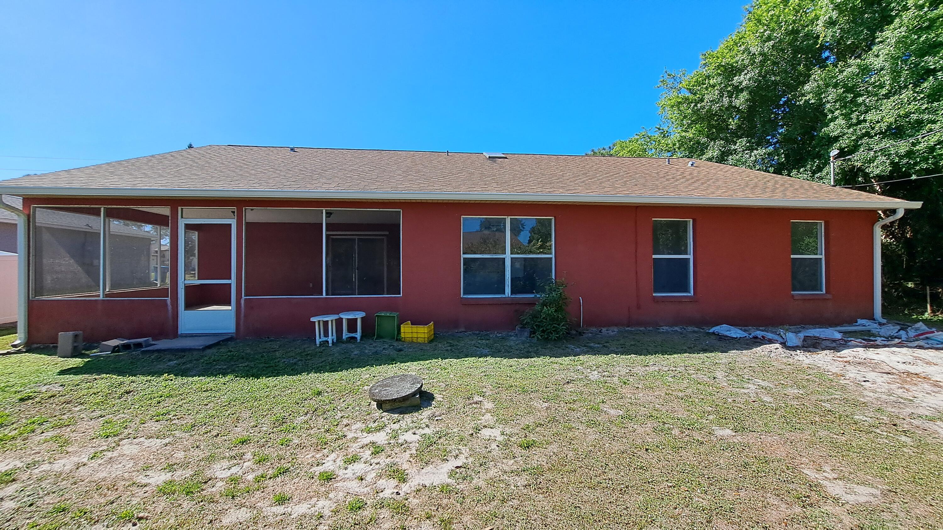 687 Raleigh Road Southeast Palm Bay, FL 32909 - Photo 4 of 26 Rear View