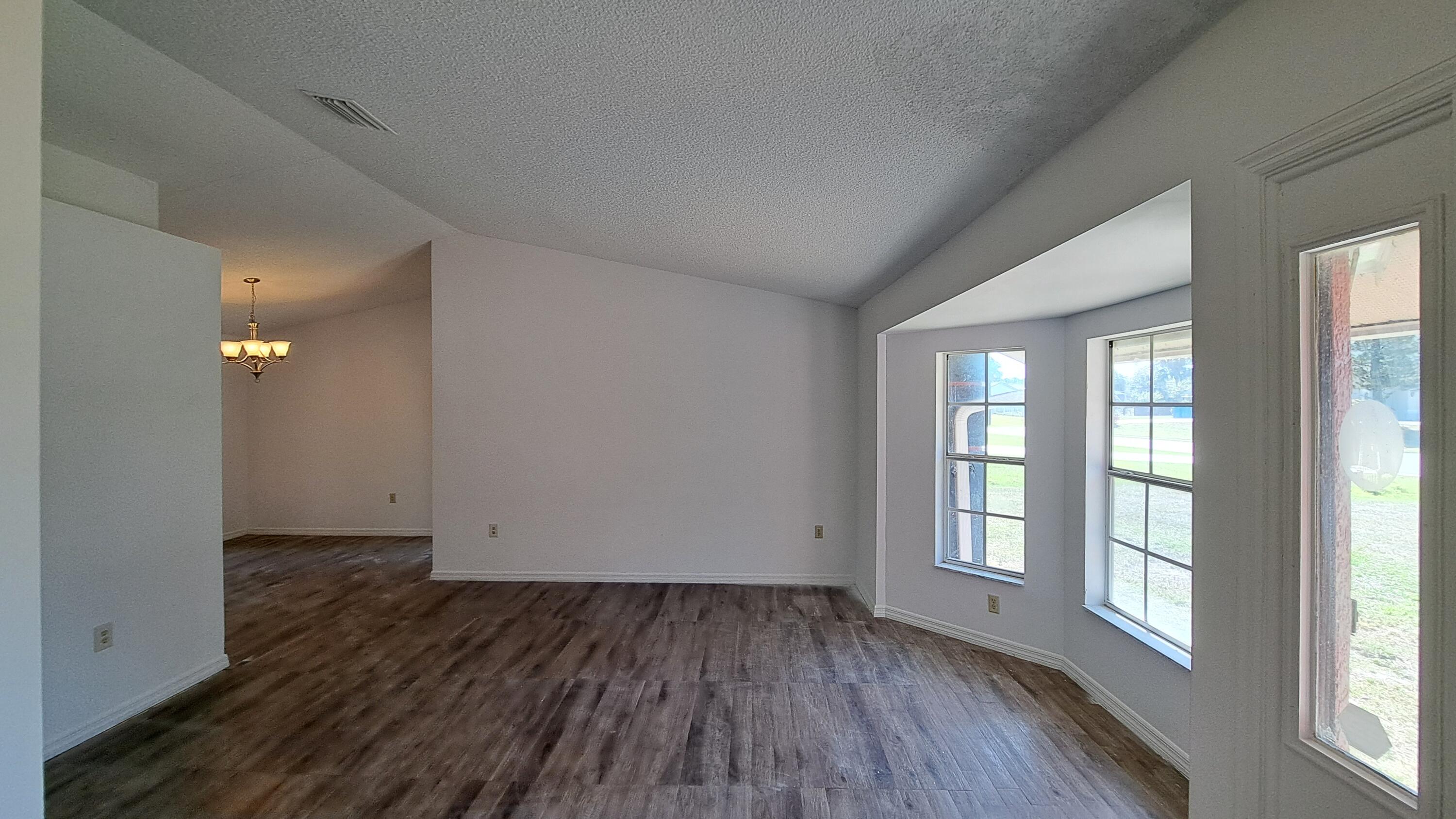 687 Raleigh Road Southeast Palm Bay, FL 32909 - Photo 6 of 26 Living Room