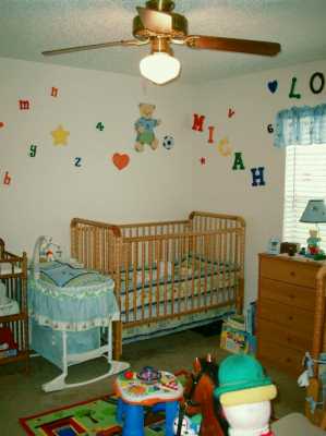 7202 Mansions Drive, Unit F2 Corpus Christi, TX 78414 - Photo 7 of 10 a bedroom with a bed and a window