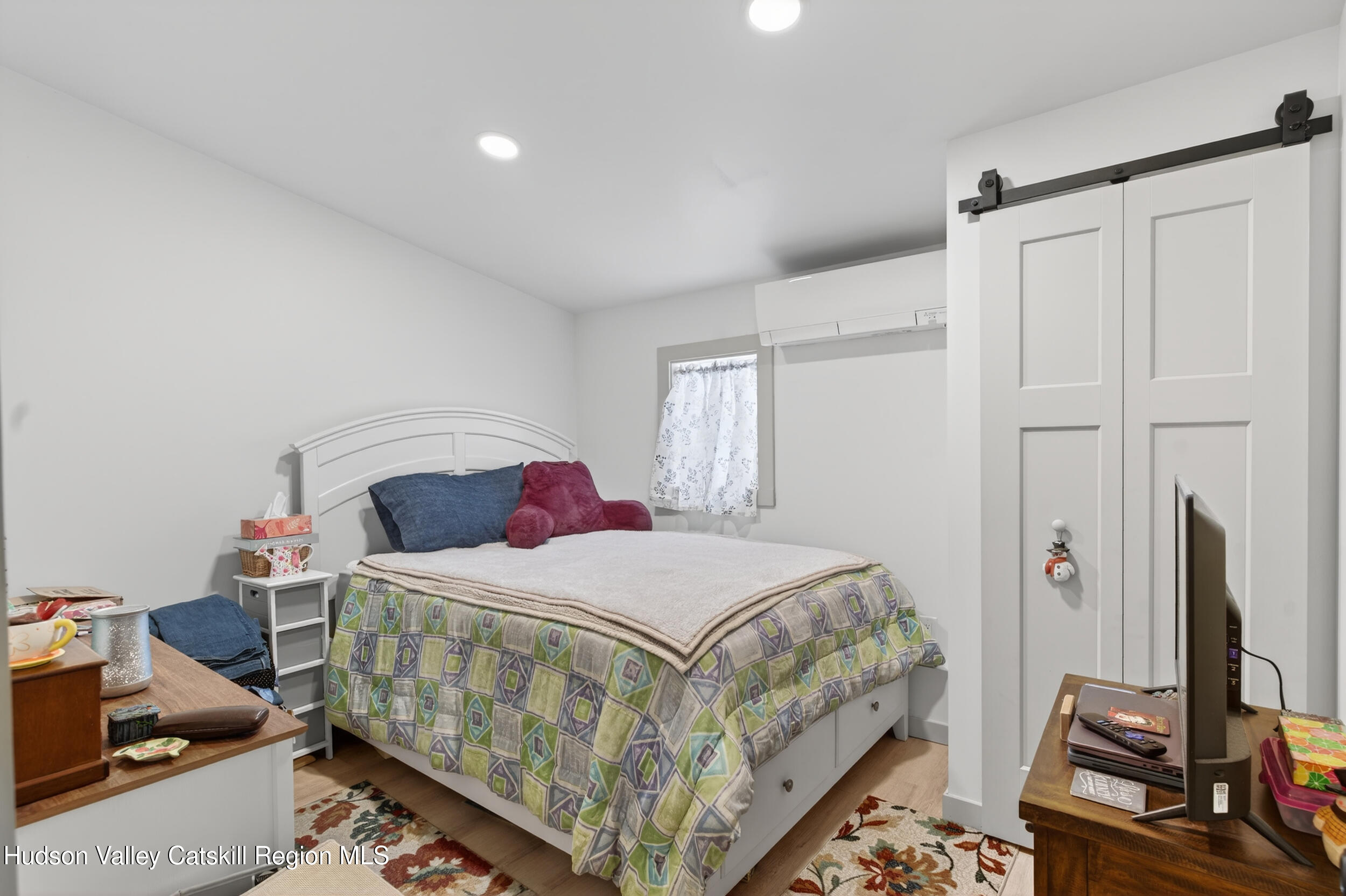 3-5 Dutchtown Road Saugerties, NY 12477 - Photo 19 of 25 a bedroom with a bed and a flat screen tv