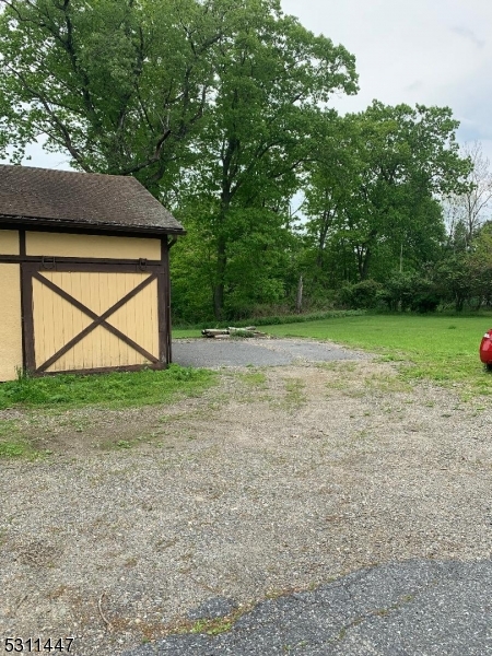 917 Main Street Newton, NJ 07860 - Photo 3 of 14 a view of backyard and green space