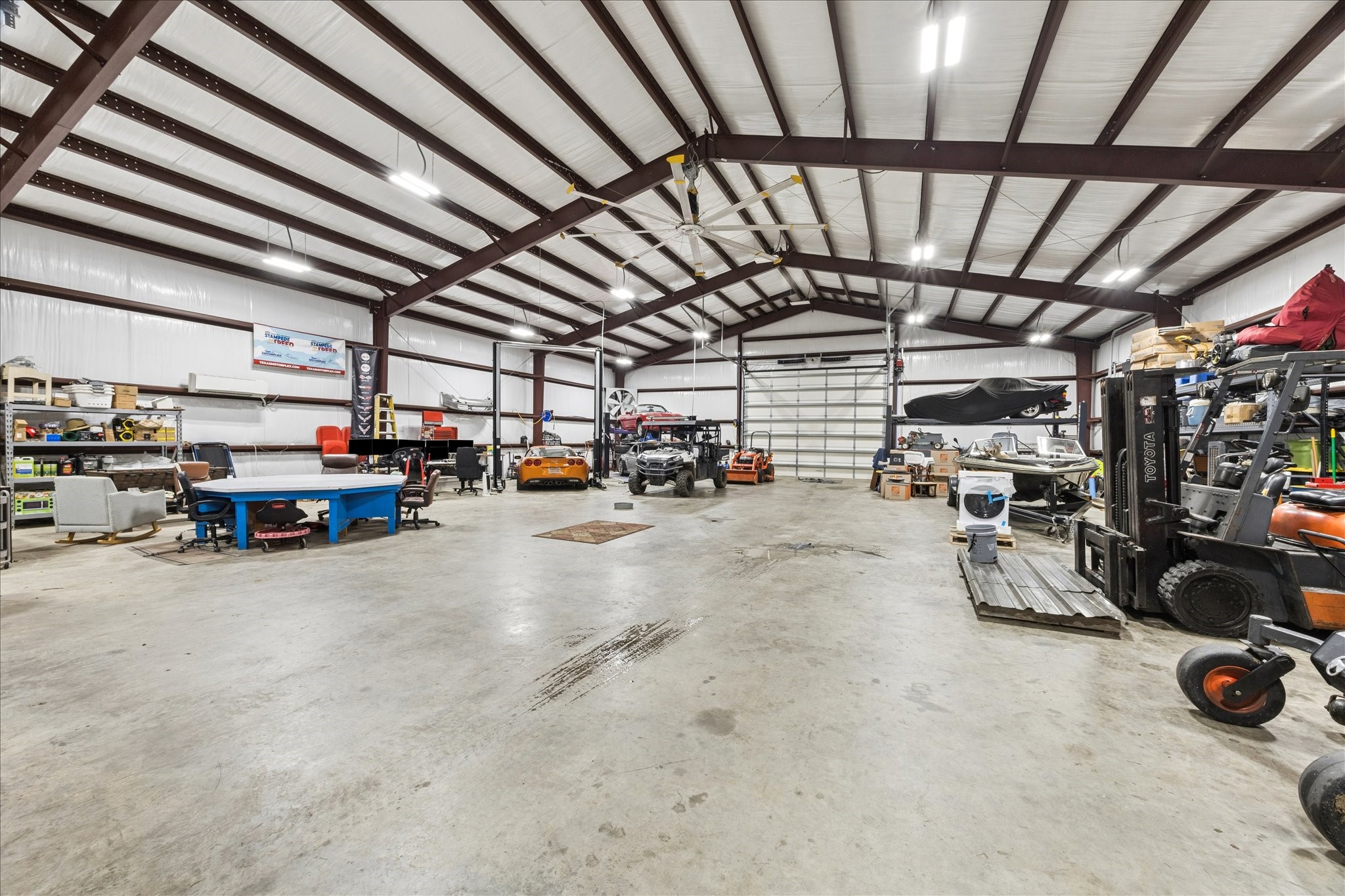 2702 Horseshoe Lane Rosharon, TX 77583 - Photo 7 of 43 Shop features drive-through access with custom insulated hurricane-braced overhead doors