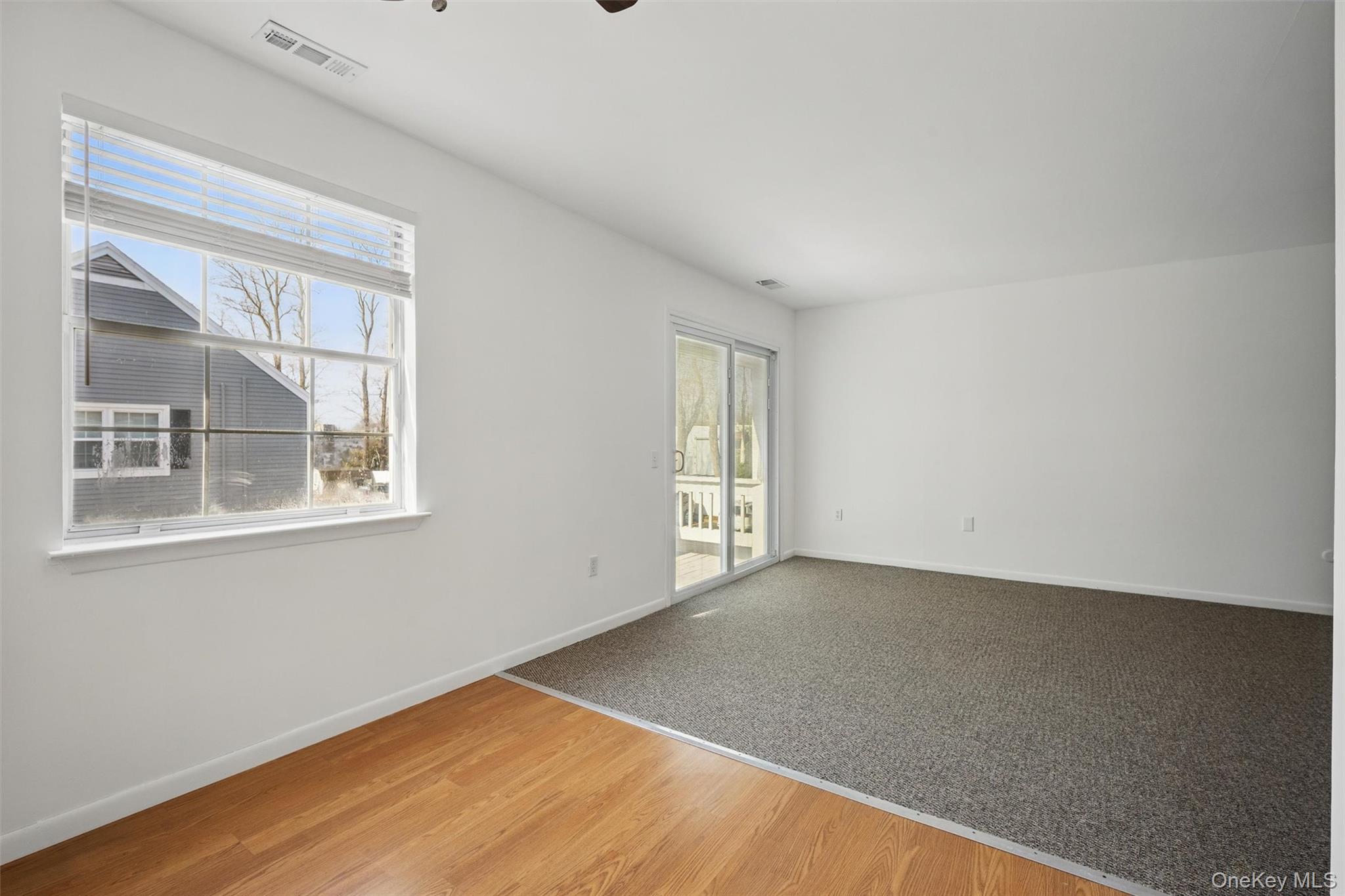 201 Commons Way, Unit E Fishkill, NY 12524 - Photo 11 of 30 an empty room with a window