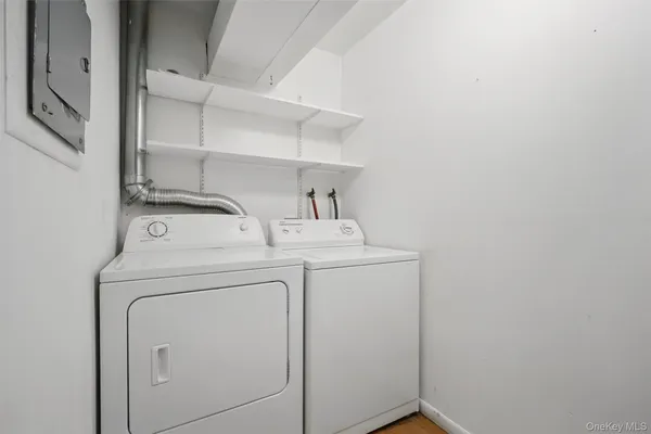 a utility room with dryer and washer