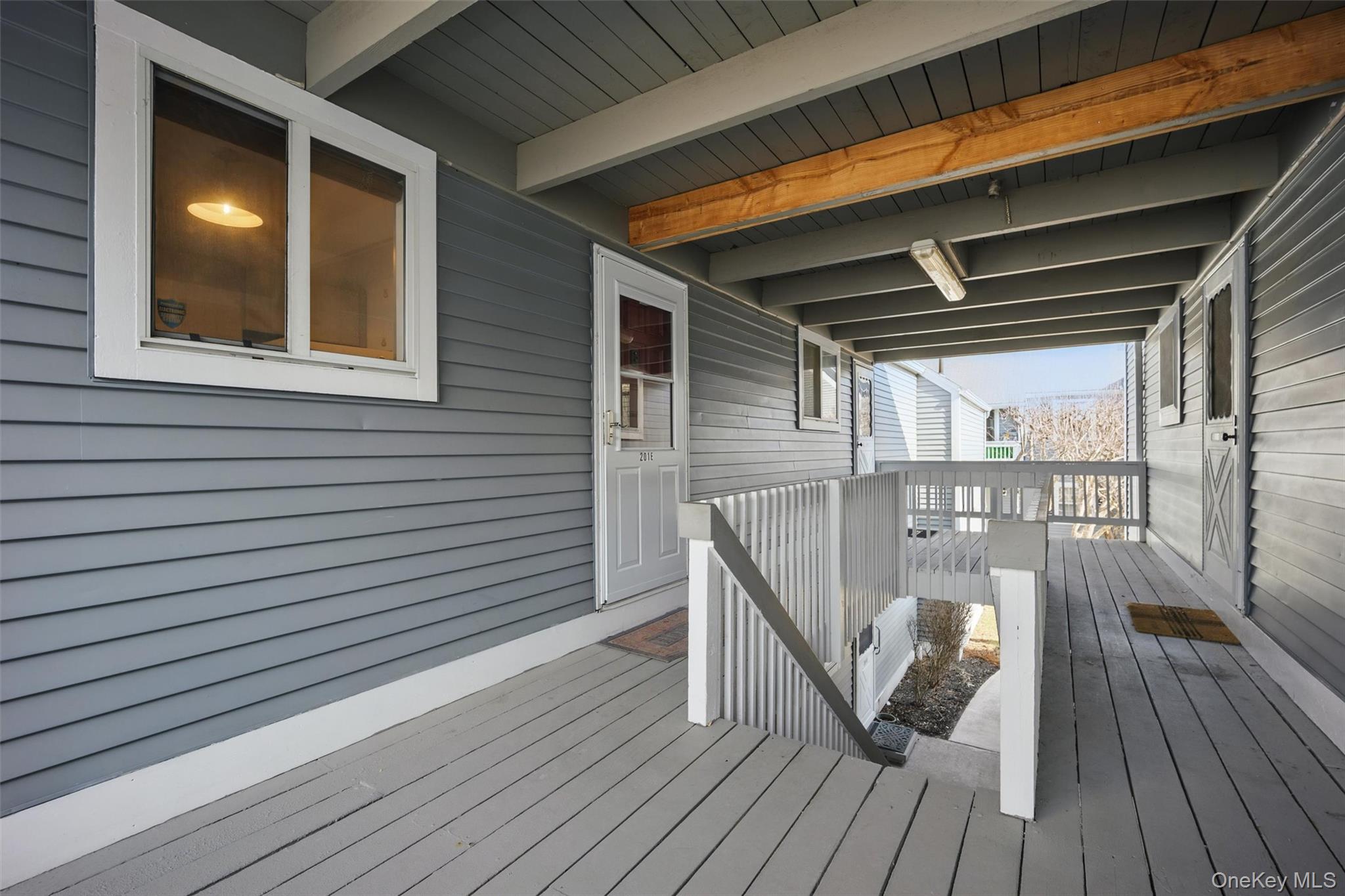 201 Commons Way, Unit E Fishkill, NY 12524 - Photo 4 of 30 a view of deck with patio